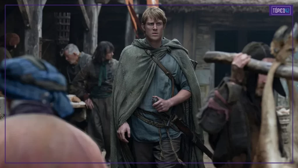 Cena de O Cavaleiro dos Sete Reinos mostra Dunk caminhando por vilarejo em Westeros durante a jornada com Egg.