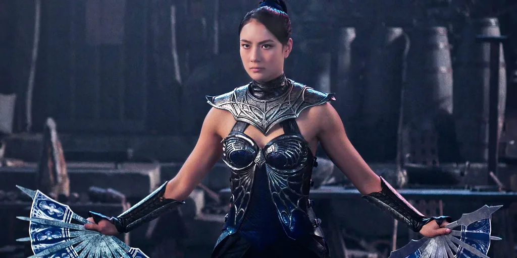 Kitana empunha seus leques de aço em uma cena de Mortal Kombat 2.